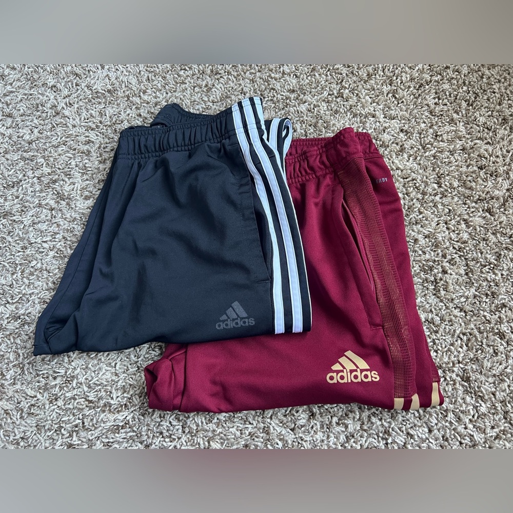 Bundle of two Adidas track pants. Size M.